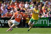 14 June 2015; Martin McElhinney, Donegal, in action against Finnian Moriarty, Armagh. Ulster GAA Football Senior Championship Quarter-Final, Armagh v Donegal. Athletic Grounds, Armagh. Picture credit: Oliver McVeigh / SPORTSFILE