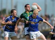 14 June 2015; Graham Reilly, Meath, in action against Paul McLoughlin, left, and Mark Kenny, Wicklow. Leinster GAA Football Senior Championship Quarter-Final, Meath v Wicklow. Páirc Táilteann, Navan, Co. Meath. Picture credit: Dáire Brennan / SPORTSFILE