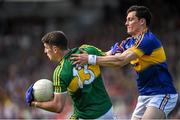 14 June 2015; Paul Geaney, Kerry, in action against Ciaran McDonald, Tipperary. Munster GAA Football Senior Championship Semi-Final, Kerry v Tipperary. Semple Stadium, Thurles, Co. Tipperary. Picture credit: Ray McManus / SPORTSFILE