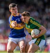 14 June 2015; James O'Donoghue, Kerry, in action against Michael Quinlivan, Tipperary. Munster GAA Football Senior Championship Semi-Final, Kerry v Tipperary. Semple Stadium, Thurles, Co. Tipperary. Picture credit: Ray McManus / SPORTSFILE