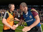 14 June 2015; Mayo joint manager Noel Connelly, left, shakes hands with Kevin Walsh, Galway manager, at the end of the game. Connacht GAA Football Senior Championship Semi-Final, Galway v Mayo. Pearse Stadium, Galway. Picture credit: David Maher / SPORTSFILE