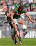 14 June 2015; Aidan O'Shea, Mayo, in action against Michael Lundy, Galway. Connacht GAA Football Senior Championship Semi-Final, Galway v Mayo. Pearse Stadium, Galway. Picture credit: Piaras Ó Mídheach / SPORTSFILE