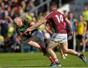 14 June 2015; Tom Cunniffe, Mayo, in action against Damien Comer, Galway. Connacht GAA Football Senior Championship Semi-Final, Galway v Mayo. Pearse Stadium, Galway. Picture credit: Piaras Ó Mídheach / SPORTSFILE