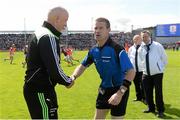 14 June 2015; Mayo joint-manager Pat Holmes shares a joke with referee Padraig Hughes before the game. Connacht GAA Football Senior Championship Semi-Final, Galway v Mayo. Pearse Stadium, Galway. Picture credit: Piaras Ó Mídheach / SPORTSFILE