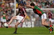14 June 2015; Thomas Flynn, Galway, in action against Tom Parsons, Mayo. Connacht GAA Football Senior Championship Semi-Final, Galway v Mayo. Pearse Stadium, Galway. Picture credit: Piaras Ó Mídheach / SPORTSFILE