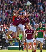 14 June 2015; Tom Parsons, Mayo, in action against Gary O'Donnell and Thomas Flynn, Galway. Connacht GAA Football Senior Championship Semi-Final, Galway v Mayo. Pearse Stadium, Galway. Picture credit: David Maher / SPORTSFILE