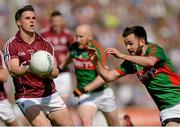 14 June 2015; Seán Denvir, Galway, in action against Kevin McLoughlin, Mayo. Connacht GAA Football Senior Championship Semi-Final, Galway v Mayo. Pearse Stadium, Galway. Picture credit: Piaras Ó Mídheach / SPORTSFILE