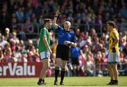 14 June 2015; Kevin Maguire, Westmeath,is shown a black card by referee Fergal Kelly. Leinster GAA Football Senior Championship Quarter-Final, Westmeath v Wexford. Cusack Park, Mullingar, Co. Westmeath. Photo by Sportsfile