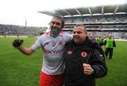 16 August 2008; Tyrone's Joseph McMahon celebrates with team trainer Fergal McCann after the match. GAA Football All-Ireland Senior Champoinship Quarter-Final, Dublin v Tyrone, Croke Park, Dublin. Picture credit: Stephen McCarthy / SPORTSFILE *** Local Caption *** Fergal McCann