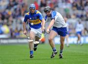 17 August 2008; Eoin Kelly, Tipperary, in action against Kevin Moran, Waterford. GAA Hurling All-Ireland Senior Championship Semi-Final, Tipperary v Waterford, Croke Park, Dublin. Picture credit: Pat Murphy / SPORTSFILE