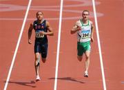 18 August 2008; Paul Hession, 2045, Ireland, alongside Wallace Spearmon, 3236, of the USA, during the Round 1 heats of the Men's 400m heats, where he finished 3rd in a time of 20.59 and progressed to Round 2. Beijing 2008 - Games of the XXIX Olympiad, National Stadium, Olympic Green, Beijing, China. Picture credit: Brendan Moran / SPORTSFILE