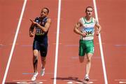 18 August 2008; Paul Hession, 2045, Ireland, finishes alongside Wallace Spearmon, 3236, of the USA, during the Round 1 heats of the Men's 400m heats, where he finished 3rd in a time of 20.59 and progressed to Round 2. Beijing 2008 - Games of the XXIX Olympiad, National Stadium, Olympic Green, Beijing, China. Picture credit: Brendan Moran / SPORTSFILE