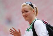 18 August 2008; Eileen O'Keeffe, Ireland, waves to supporters in the crowd after Group B qualifying in the Women's Hammer. She threw a best of 67.66m but failed to qualify for the final. Beijing 2008 - Games of the XXIX Olympiad, National Stadium, Olympic Green, Beijing, China. Picture credit: Brendan Moran / SPORTSFILE