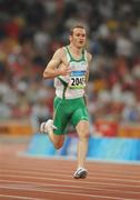 18 August 2008; Paul Hession, Ireland, on his way to winning his Round 2 heat of the Men's 200m in a season best time of 20.32 and qualifying for the semi-finals. Beijing 2008 - Games of the XXIX Olympiad, National Stadium, Olympic Green, Beijing, China. Picture credit: Brendan Moran / SPORTSFILE