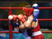19 August 2008; Paddy Barnes, Ireland, in action against Lukasz Maszczyk, in blue from Poland, during their quarter-final bout of the Light Fly weight, 48kg, contest. Beijing 2008 - Games of the XXIX Olympiad, Beijing Workers Gymnasium, Olympic Green, Beijing, China. Picture credit: Ray McManus / SPORTSFILE