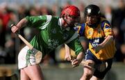 26 March 1999; Brian Begley, Limerick in action against Frank Lohan, Clare, Clare v Limerick, National hurling League, Miltown Malbay, Co. Clare. Picture credit; Damien Eagers/SPORTSFILE