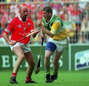 6 August 2000; Michael Duignan, Offaly, in action against Brian Corcoran, Cork. Offaly v Cork, All-Ireland Senior Hurling Championship Semi Final, Croke Park, Dublin. Picture credit; Ray McManus/SPORTSFILE