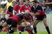 12 August 2000; Phil Glamuzina, Munster, is tackled by Gloucester, 7 Jacke Boer and Ian Jones. Munster v Gloucester, Rugby, Thomand Park, Limerick. Picture credit; Matt Browne/SPORTSFILE *EDI*