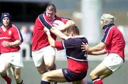 12 August 2000; Peter Bracken, Munster, is tackled by Gloucester Rob Fidler, also pictured is Phil Glamuzina, Munster. Munster v Gloucester, Rugby, Thomand Park, Limerick. Picture credit; Matt Browne/SPORTSFILE *EDI*