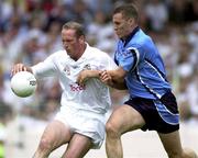 12 August 2000; Willie McCreery, Kildare, in action against Ciaran Whelan, Dublin. Dublin v Kildare, Leinster Football Final Replay, Croke Park, Dublin. Picture credit; Brendan Moran/SPORTSFILE *(EDI)*