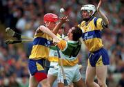 3 September 1995; Johnny Dooley, Offaly under pressure from Brian Lohan, left, and Frank Lohan, Clare, Clare v Offaly, All Ireland hurling Final, Croke Park, Dublin. Picture credit; Ray McManus/SPORTSFILE