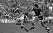 1 September 1985; Joe Dooley, Offaly left, races clear of Ollie Kilkenny, Galway, All Ireland Hurling Final, Offaly v Galway, Croke Park, Dublin. Picture credit; Ray McManus/SPORTSFILE