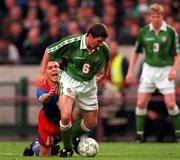 Ireland's Roy KEANE and Liechtenstein's Daniel FRICK  21/5/97 Lansdowne Road Soccer. Photograph Brendan Moran / SPORTSFILE