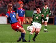 Rep of Ireland's Ian Harte in a tussle for possession with Daniel Hasler, Liechtenstein at Lansdowne Rd.   Rep of Ireland (5) v Liechtenstein (0). Soccer. 21/5/97. Photograph: David Maher SPORTSFILE.