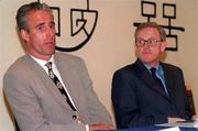 Rep of Ireland manager Mick McCarthy looking anxious at a press conference in Dublin Airport yesterday morning (Fri. 12/4/96). Pictured with him is former Government Press Officer Frank Dunlop. Soccer. Photograph: David Maher / Sportsfile.