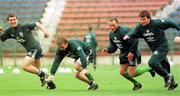 Roy Keane, David Connolly, Terry Phelan and Ray Houghton pictured during an Irish squad training session in the Steuea Stadium, Bucharest. 29/4/97. Soccer. Photograph: David Maher SPORTSFILE.