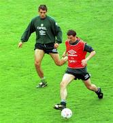 Roy Keane and Jon Goodman pictured during an Irish squad training session in the Steuea Stadium, Bucharest. 29/4/97. Soccer. Photograph: David Maher SPORTSFILE.
