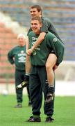 Roy Keane and Richard Dunne pictured during an Irish squad training session in the Steuea Stadium, Bucharest. 29/4/97. Soccer. Photograph: David Maher SPORTSFILE.