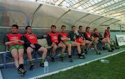 Irish players from left, Andy Townsend, Gary Kelly, Ray Houghton, Tony Cascarino, David Kelly, Roy Keane, Jeff Kenna, Steve Staunton and Denis Irwin take a breather during a training session in the Controceni Stadium in Bucharest, Romania.  Mon 28/4/97. Soccer. Photograph: David Maher SPORTSFILE.