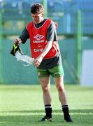 Rep of Ireland's Andy Townsend washes out his boot during a training session in the Controceni Stadium in Bucharest, Romania. Soccer. Photograph: Ray McManus SPORTSFILE.