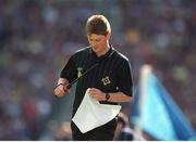 9 September 2001; Linesman Barry Kelly attempts to put the cloth flag back on the flagstick during the game. Tipperary v Galway, All Ireland Senior Hurling Final, Croke Park, Dublin. Picture credit; Aoife Rice / SPORTSFILE