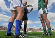 14 June 2015; Referee Barry Cassidy speaks to the captains, Dean Healy, Wicklow, and Donal Keogan, Meath, before the game. Leinster GAA Football Senior Championship Quarter-Final, Meath v Wicklow. Páirc Táilteann, Navan, Co. Meath. Picture credit: Dáire Brennan / SPORTSFILE