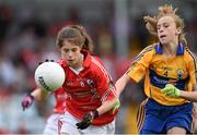 14 June 2015; Cork's Annie Maher in action against Clare's Megan Downes Rigney during the Primary Go Games played at half time. Munster GAA Football Senior Championship Semi-Final, Cork v Clare. Páirc Ui Rinn, Cork. Picture credit: Matt Browne / SPORTSFILE
