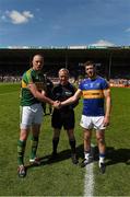 14 June 2015; Kerry captain Kieran Donaghy and Tipperary captain Paddy Codd shake hands in front of referee Ciarán Branagan. Munster GAA Football Senior Championship Semi-Final, Kerry v Tipperary. Semple Stadium, Thurles, Co. Tipperary. Picture credit: Ray McManus / SPORTSFILE