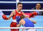 16 June 2015; Myles Casey, Ireland, left, exchanges punches with Ivan Fihurenka, Belarus, during their Men's Fly 52kg Round of 32 bout. 2015 European Games, Crystal Hall, Baku, Azerbaijan. Picture credit: Stephen McCarthy / SPORTSFILE