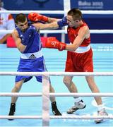 16 June 2015; Myles Casey, Ireland, right, exchanges punches with Ivan Fihurenka, Belarus, during their Men's Fly 52kg Round of 32 bout. 2015 European Games, Crystal Hall, Baku, Azerbaijan. Picture credit: Stephen McCarthy / SPORTSFILE
