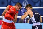 16 June 2015; Muhammad Ali, Great Britain, left, exchanges punches with Alexandr Riscan, Moldova, during their Men's Boxing Fly 52kg Round of 32 bout. 2015 European Games, Crystal Hall, Baku, Azerbaijan. Picture credit: Stephen McCarthy / SPORTSFILE