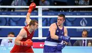 16 June 2015; Darren O'Neill, Ireland, right, exchanges punches with Ionut Jitaru, Romania, during their Men's Boxing Heavy 91kg Round of 32 bout. 2015 European Games, Crystal Hall, Baku, Azerbaijan. Picture credit: Stephen McCarthy / SPORTSFILE