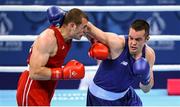 16 June 2015; Darren O'Neill, Ireland, right, exchanges punches with Ionut Jitaru, Romania, during their Men's Boxing Heavy 91kg Round of 32 bout. 2015 European Games, Crystal Hall, Baku, Azerbaijan. Picture credit: Stephen McCarthy / SPORTSFILE