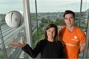 16 June 2015; Dublin football star Michael Darragh MacAuley with Lisa Comerford, Director of Brand and Communications, eircom, before they joined eircom’s GAA ambassadors Tomás O’Sé, Ciaran Whelan, David Brady and Brendan Devenney in eircom’s head office in Dublin to launch their online platform for supporters of this summer’s GAA Football All-Ireland Senior Championship. The GAA hub, www.eircom.ie/gaa, will see the introduction of a new feature where fans can record and share their views on players throughout the championship via a new audio social network BOAST and be in with a chance to win tickets to the All-Ireland Senior Football Final. #shoutitout. eircom Head Office, HSQ, Dublin. Picture credit: Brendan Moran / SPORTSFILE