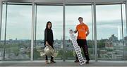 16 June 2015; Dublin football star Michael Darragh MacAuley with Lisa Comerford, Director of Brand and Communications, eircom, before they joined eircom’s GAA ambassadors Tomás O’Sé, Ciaran Whelan, David Brady and Brendan Devenney in eircom’s head office in Dublin to launch their online platform for supporters of this summer’s GAA Football All-Ireland Senior Championship. The GAA hub, www.eircom.ie/gaa, will see the introduction of a new feature where fans can record and share their views on players throughout the championship via a new audio social network BOAST and be in with a chance to win tickets to the All-Ireland Senior Football Final. #shoutitout. eircom Head Office, HSQ, Dublin. Picture credit: Brendan Moran / SPORTSFILE