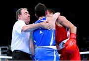 16 June 2015; Referee Micky Gallagher, Ireland, seperates Riccardo D'Andrea, Italy, and Iurii Shestak, Ukriane, during their Men's Boxing Bantam 56kg Round of 32 bout. 2015 European Games, Crystal Hall, Baku, Azerbaijan. Picture credit: Stephen McCarthy / SPORTSFILE