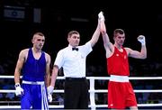 17 June 2015; Adam Nolan, Ireland, is declared victorious over Alban Beqiri, Albania, by referee Denis Popov following their Men's Boxing Welter 69kg Round of 32 bout. 2015 European Games, Crystal Hall, Baku, Azerbaijan. Picture credit: Stephen McCarthy / SPORTSFILE