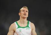 19 August 2008; Paul Hession, Ireland, reacts after crossing the line in semi-final of the Men's 200m, in which he finished 5th in a time of 20.38 seconds and 10th overall. The first 8 made the final. Beijing 2008 - Games of the XXIX Olympiad, National Stadium, Olympic Green, Beijing, China. Picture credit: Brendan Moran / SPORTSFILE