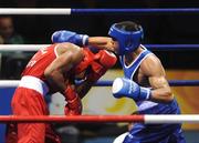 20 August 2008; Darren Sutherland, Ireland, in action against Alfonso Blanco Parra, in red from Venezuela, during their quarter-final bout of the Middle weight, 75kg, contest. Beijing 2008 - Games of the XXIX Olympiad, Beijing Workers Gymnasium, Olympic Green, Beijing, China. Picture credit: Ray McManus / SPORTSFILE