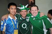 20 August 2008; Ireland boxing supporters Glenn Phelan and Colin Saunders celebrate with a Games Volunteer after attending the Quarter-Final which resulted in victory for Darren Sutherland who has now progressed to the semi-final and is guaranteed at least a bronze medal. Beijing 2008 - Games of the XXIX Olympiad, Beijing Workers Gymnasium, Olympic Green, Beijing, China. Picture credit: Ray McManus / SPORTSFILE